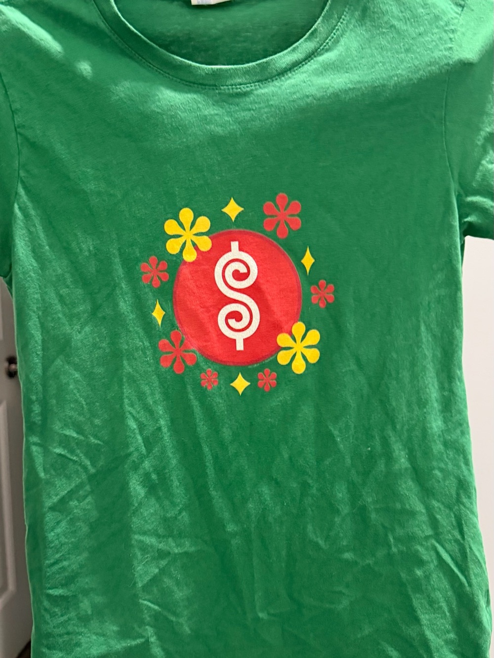 Port and Company Green Tee with Red Dollar Circle and Yellow Flower Accents